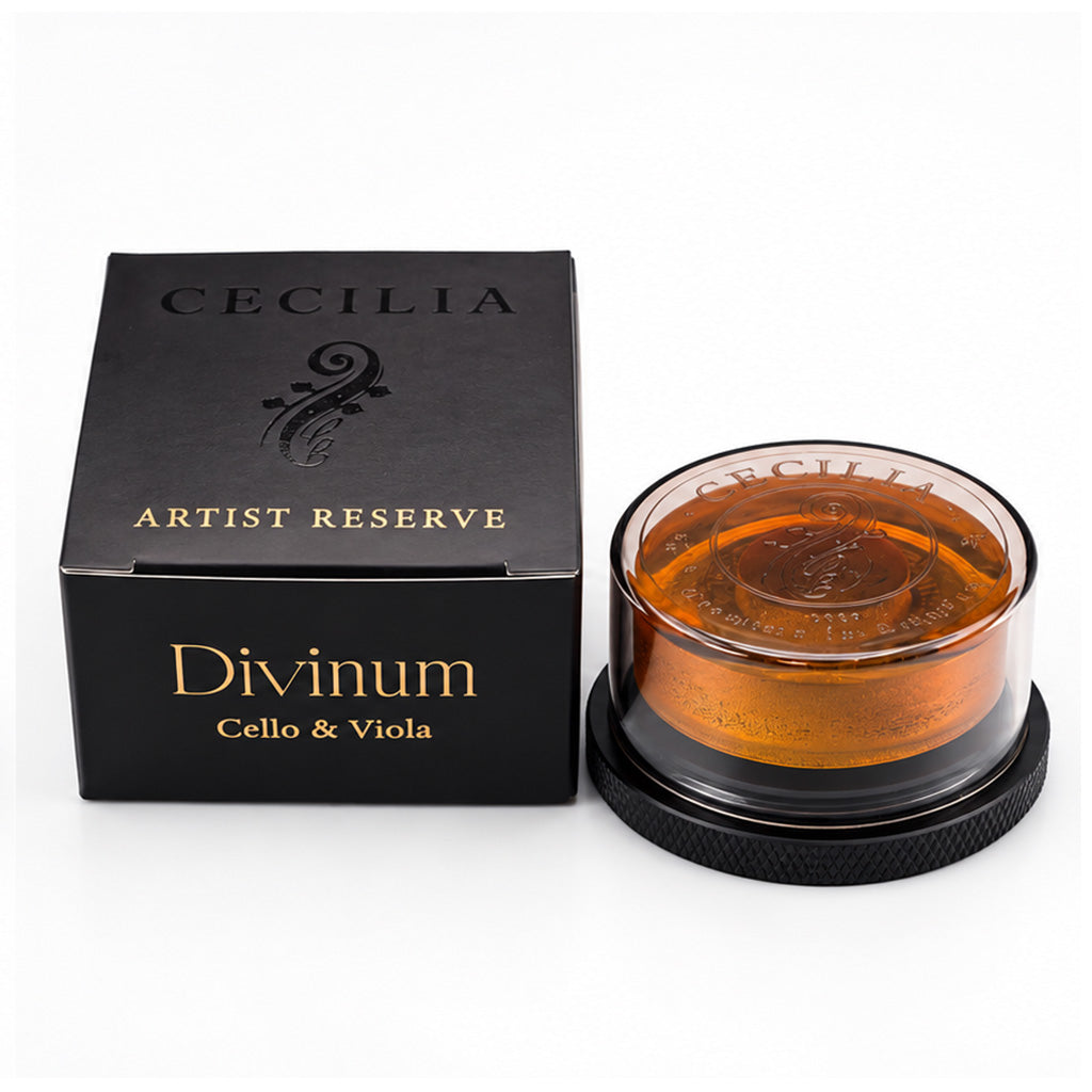 Cecilia Artist Reserve Divinum Cello and Viola Rosin with black and gold packaging and amber-colored rosin in a clear protective case.
