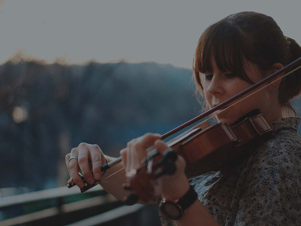 String Instruments While Playing 4 Reasons to Begin Playing a String Instrument