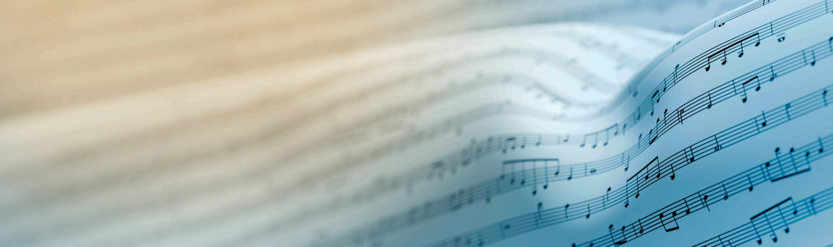 flowing sheet music with a yellow to blue color gradient