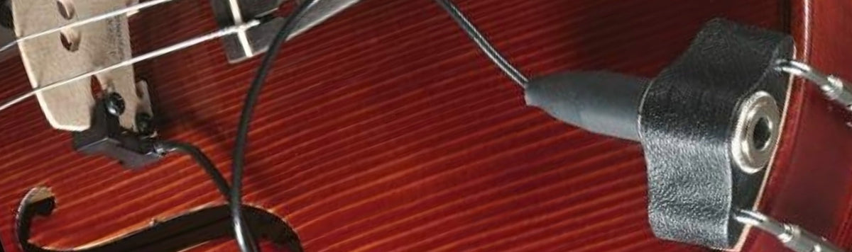 Close of of a barcus berry on a red violin