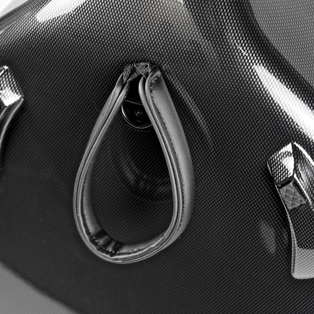 Close-up of a black cello case with handlebar grip and metallic zipper pulls.