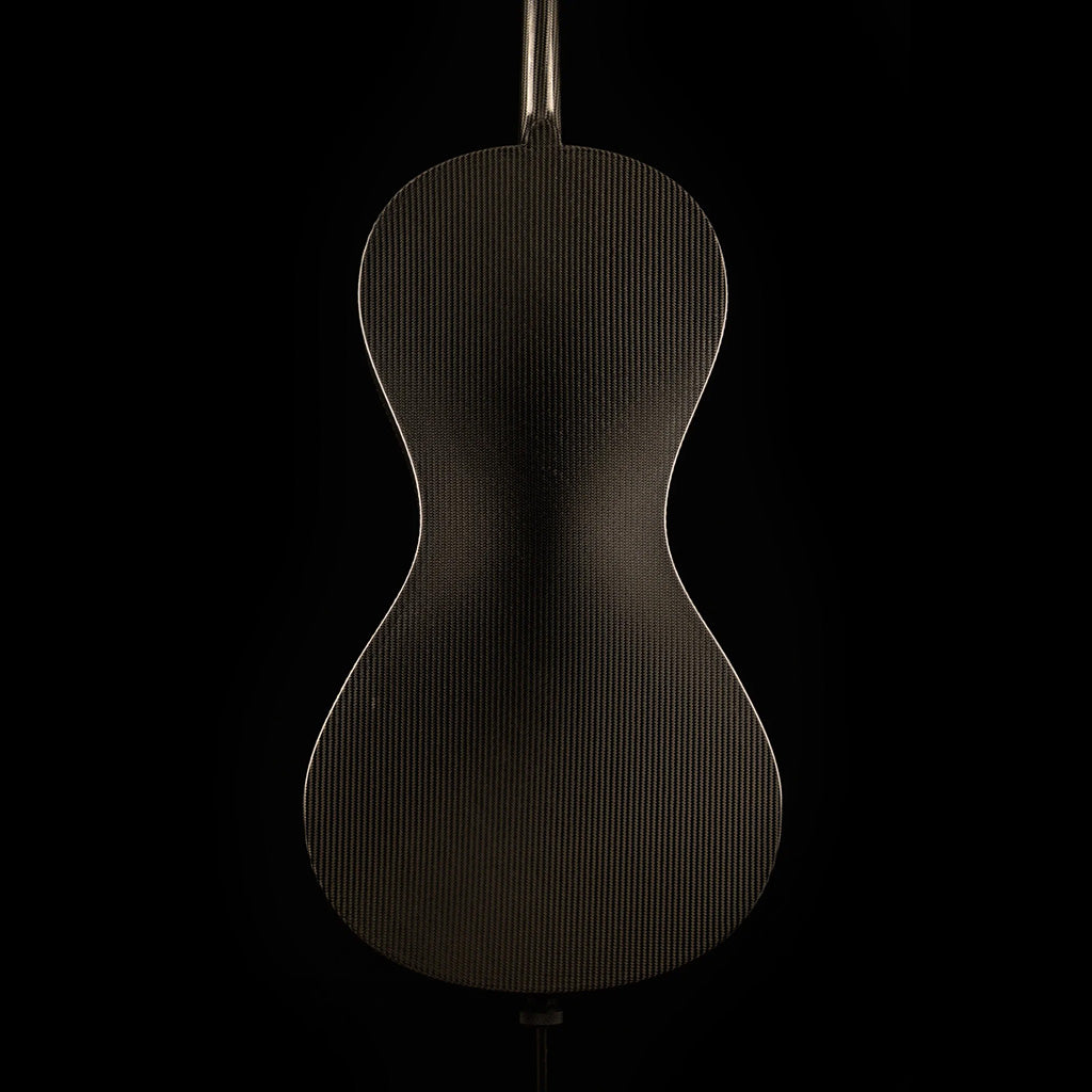 Back of a Mezzo-Forte carbon fiber cello, showing the smooth woven carbon pattern, on a black background.